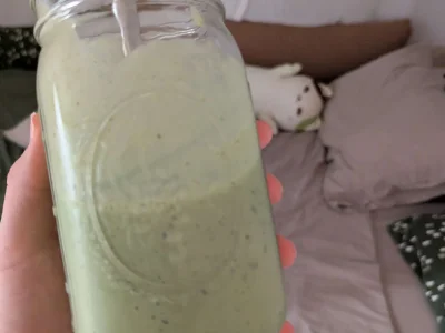 Gen's matcha colored bed and matcha colored smoothie